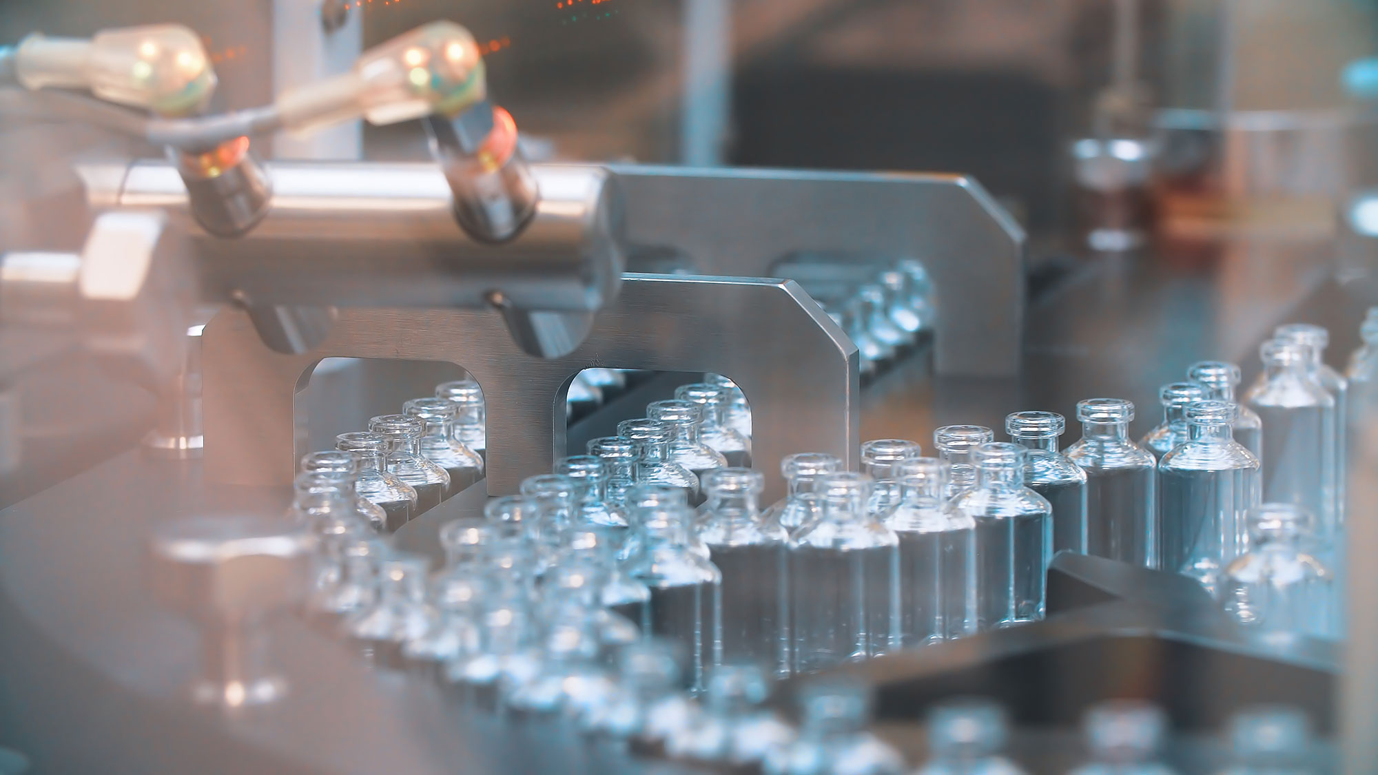 Tens of bottles on a production line in a manufacturing facility